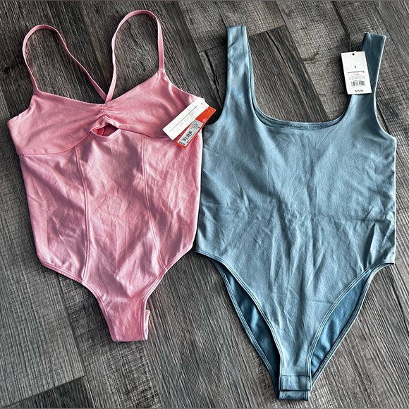 NWT bodysuit bundle. - Picture 1 of 9